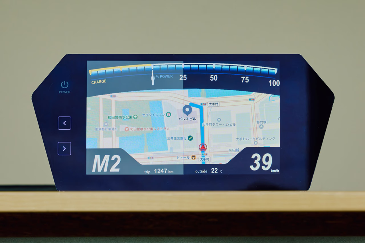 This sample vehicle-mounted display shows the right side covered with MOSMITE™ while the left side is not.